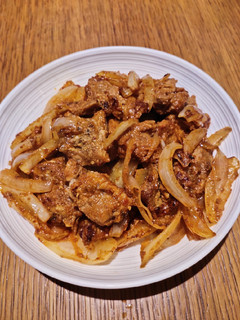 A picture of Pork with Onion and Ketchup.