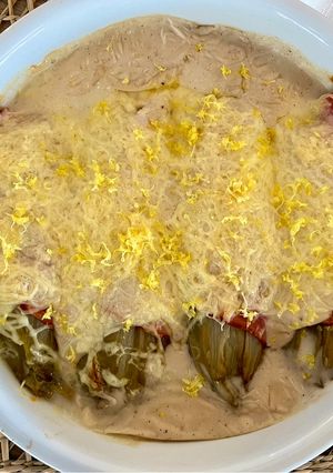A picture of Endives with Ham, Almond Milk Béchamel, and Lemon Zest.