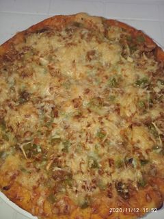 صورة لوصفة بيتزا 😋😋😋