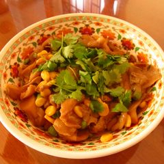 A picture of Oyster Mushrooms with peas and corn.