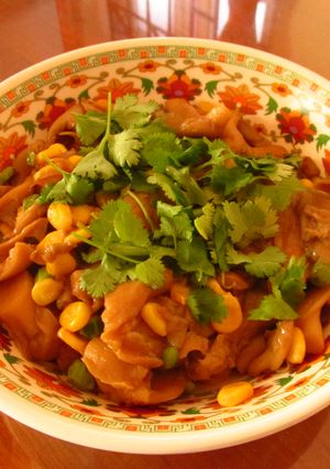 A picture of Oyster Mushrooms with peas and corn.