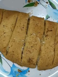 चीज़ स्टफ्ड गार्लिक ब्रेड (Cheese Stuffed Garlic Bread Recipe In Hindi) रेसिपी मुख्य फोटो