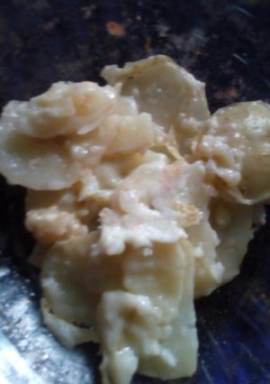 Una foto de Papas con cobija de queso
