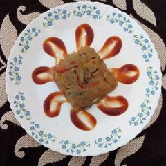 A picture of Suji Upma with veggies.