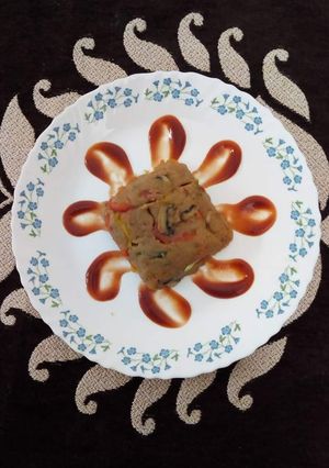 A picture of Suji Upma with veggies.