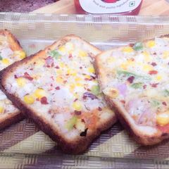 A picture of Veg open cheese sandwich.