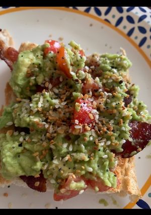 A picture of Avocado Egg in the Middle with Bacon.