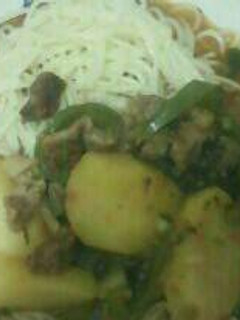 A picture of Spaghetti with beef stew.