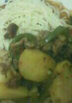 A picture of Spaghetti with beef stew.