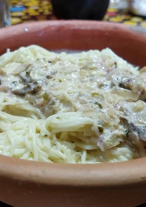 Una foto de Salsa de verdeo y champiñones