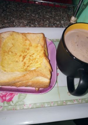 A picture of Buttered Egg Bread with Chocolate Tea.