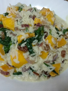 Una foto de Arroz con calabaza, espinacas y pasas