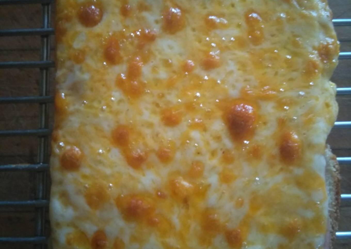 Hot open faced ham and cheese sandwich