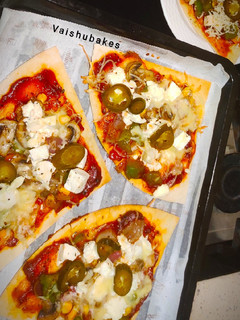 A picture of Italian Cheesy Veggie Pizza.
