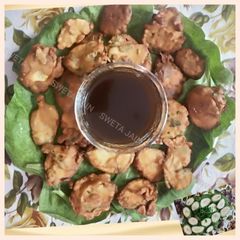 A picture of Raw Banana Palak Fritters(Jain Food).