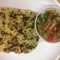 A picture of Chole kulcha (chole made of white dry peas).