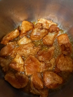 A picture of Boneless chicken in honey sauce.