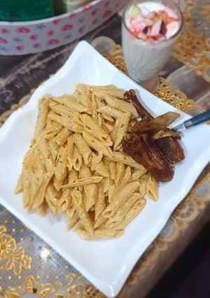 A picture of Penne alfredo pasta.