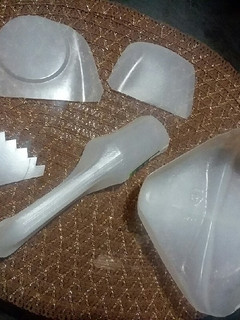 A picture of Frosting for Cake and Recycled Baking Utensils.