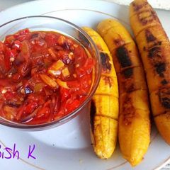 A picture of Oven grilled plantain with sauce.