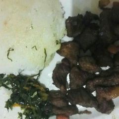 A picture of Ugali with deep fry beef.