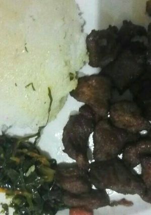 A picture of Ugali with deep fry beef.