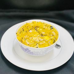 A picture of Raw Mango pachadi/mangai pachadi.