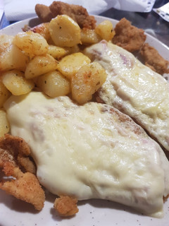 Una foto de Pollo a la milanesa