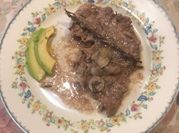 Una foto de filete al romero