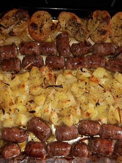 Una foto de Butifarra con vino al horno