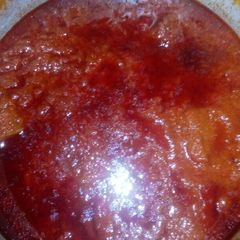 A picture of Fried chicken in palm oil stew.