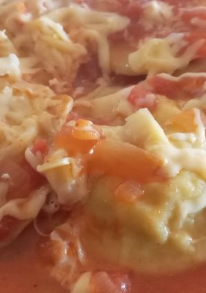Una foto de Sorrentinos de ricota, cebolla y queso