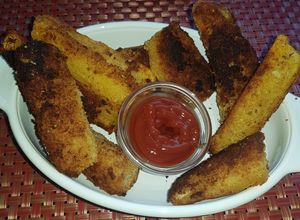 Una foto de Palitos de yucas fritas y crocantes
