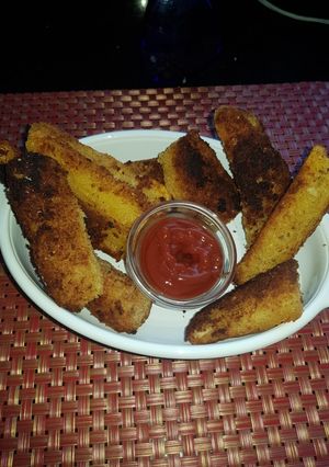 Una foto de Palitos de yucas fritas y crocantes