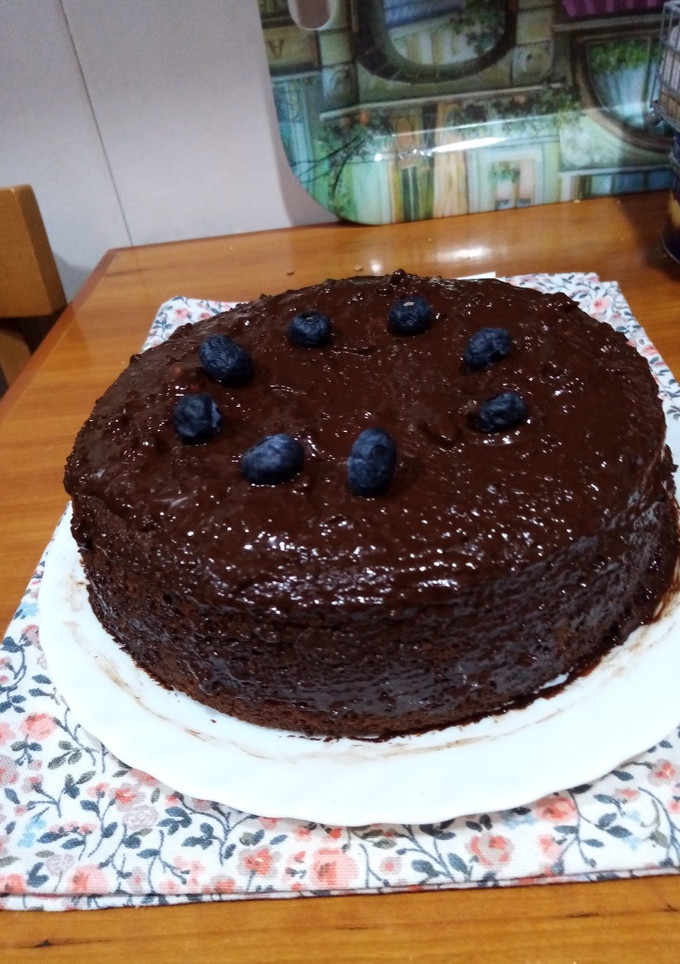 Una foto de Bizcocho de naranja con cobertura de chocolate