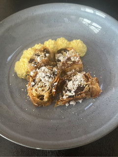 A picture of Rum Glazed Almond & Raisin Filo Roll with Rum Cream.