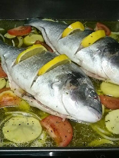 Una foto de 🐡🐡Dorada al horno 🐡🐡