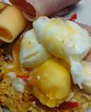 Huevos benedictinos sobre papas rostis