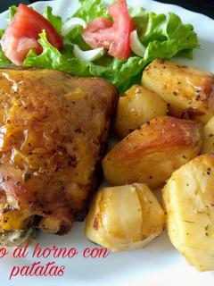 Una foto de Pollo al horno con patatas