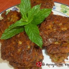 Zucchini fritters with dill and feta cheese A picture of Zucchini fritters with dill and feta cheese.