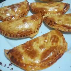 Una foto de Empanadillas de atún en escabeche al horno