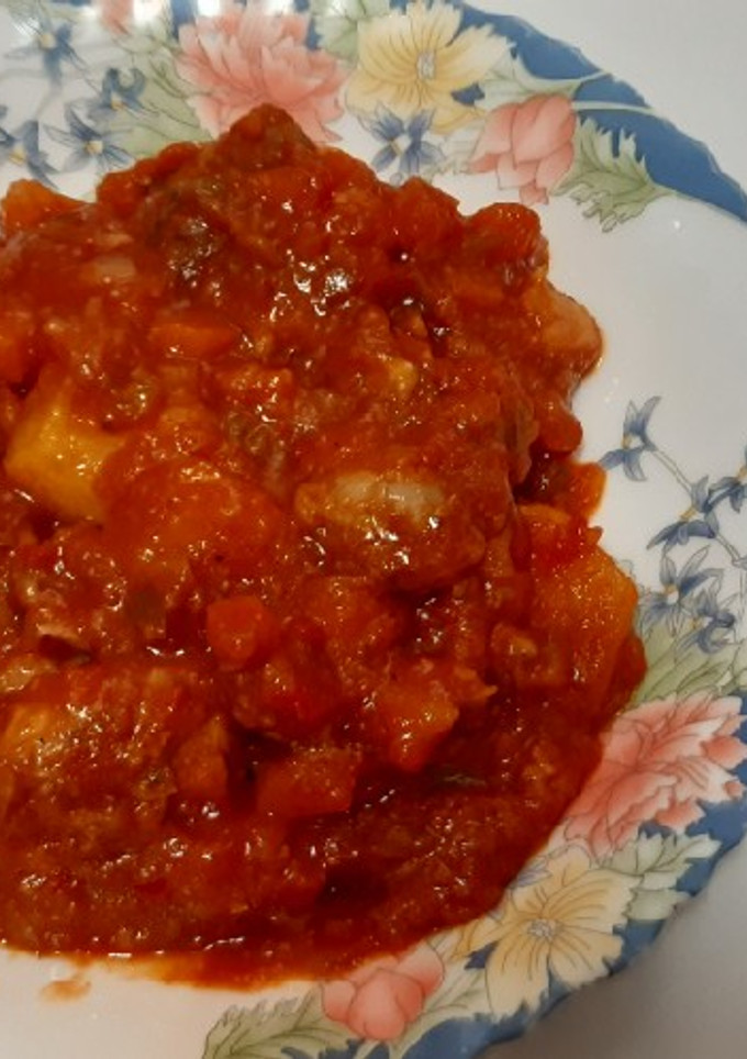 Una foto de Conejo en salsa de tomate
