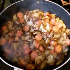 A picture of Fried Potatoes and Smoked Sausage with Bacon GF.