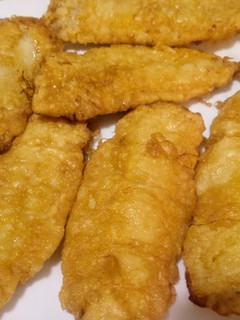 Una foto de Filetes de merluza rebozada