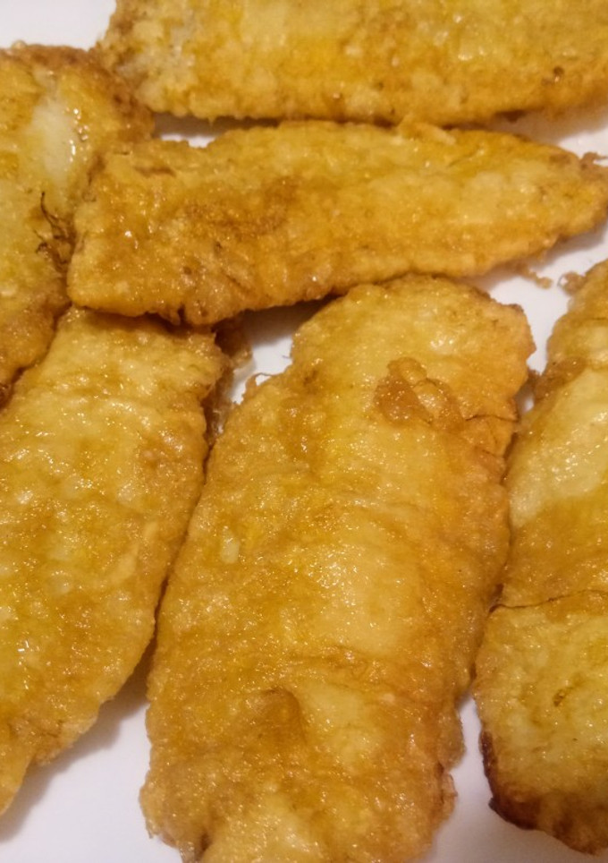 Una foto de Filetes de merluza rebozada