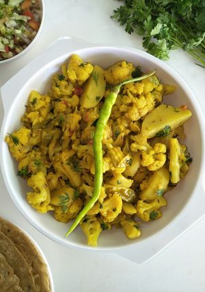 A picture of Aaloo Gobhi (Cauliflower Potato Veg In Restaurant Style).