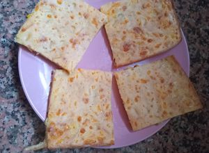 Una foto de Fainá de Choclo y Queso Parmesano
