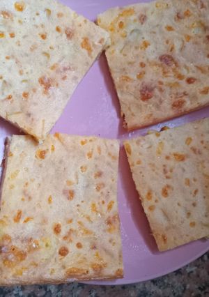Una foto de Fainá de Choclo y Queso Parmesano