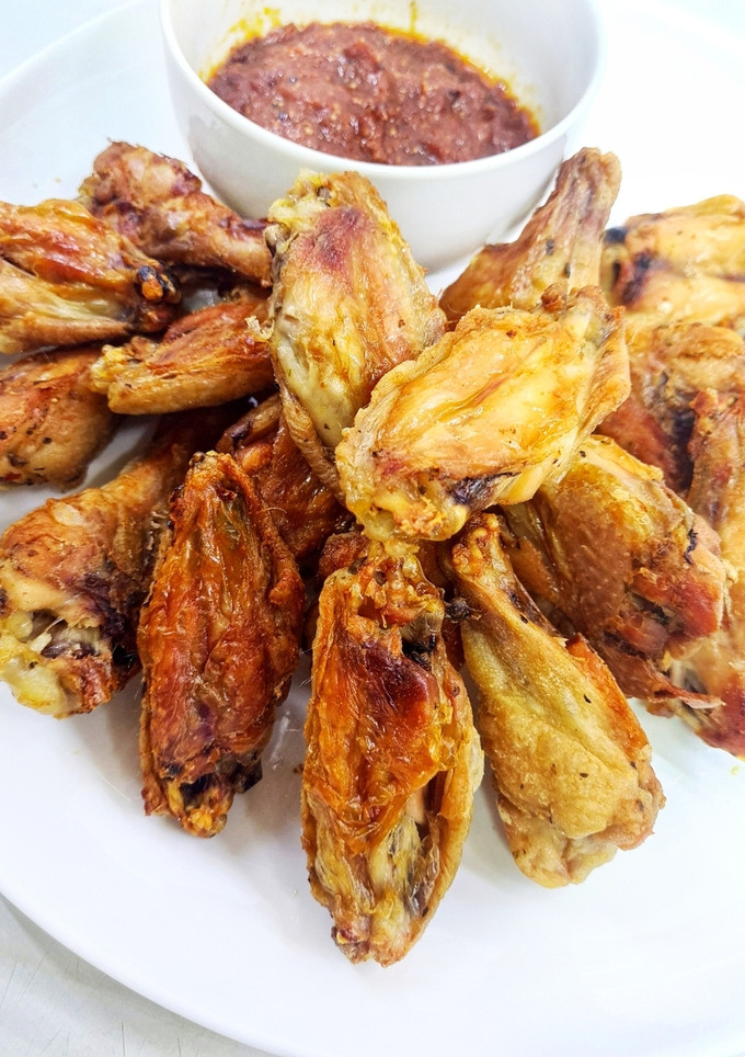 Una foto de Alitas de pollo al horno súper crujientes