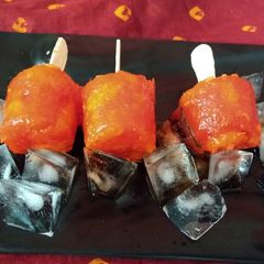 A picture of Orange popsicles.